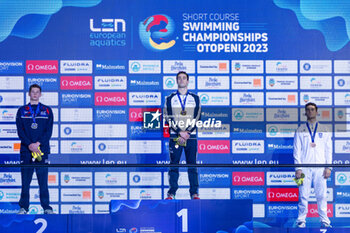 2023-12-10 - Razzetti Alberto of Italy, Scott Duncan of Great Britain and Papastamos Apostolos of Greece during the podium ceremony for Men’s 400m Individual Medley at the LEN Short Course European Championships 2023 on December 10, 2023 in Otopeni, Romania - SWIMMING - LEN SHORT COURSE EUROPEAN CHAMPIONSHIPS 2023 - DAY 6 - SWIMMING - SWIMMING