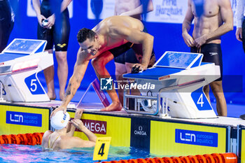 2023-12-10 - Manaudou Florent of France congratulating Bonnet Charlotte of France during Mixed 4x50m Medley Relay Final at the LEN Short Course European Championships 2023 on December 10, 2023 in Otopeni, Romania - SWIMMING - LEN SHORT COURSE EUROPEAN CHAMPIONSHIPS 2023 - DAY 6 - SWIMMING - SWIMMING