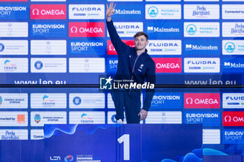 2023-12-10 - Grousset Maxime of France during the podium ceremony for Men’s 100m Freestyle at the LEN Short Course European Championships 2023 on December 10, 2023 in Otopeni, Romania - SWIMMING - LEN SHORT COURSE EUROPEAN CHAMPIONSHIPS 2023 - DAY 6 - SWIMMING - SWIMMING