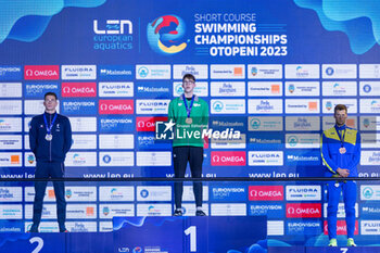 10/12/2023 - Wiffen Daniel of Ireland, Aubry David of France and Romanchuk Mykhailo of Ukraine during the podium ceremony for Men’s 800m Freestyle at the LEN Short Course European Championships 2023 on December 10, 2023 in Otopeni, Romania - SWIMMING - LEN SHORT COURSE EUROPEAN CHAMPIONSHIPS 2023 - DAY 6 - NUOTO - NUOTO