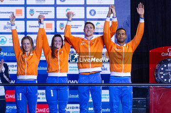 2023-12-10 - Toussaint Kira, Corbeau Caspar, Giele Tessa and Simons Knezo of the Netherlands during the podium ceremony for Mixed 4x50m Medley Relay at the LEN Short Course European Championships 2023 on December 10, 2023 in Otopeni, Romania - SWIMMING - LEN SHORT COURSE EUROPEAN CHAMPIONSHIPS 2023 - DAY 6 - SWIMMING - SWIMMING