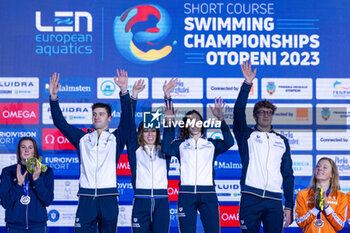 10/12/2023 - Mora Lorenzo, Martinenghi Nicolo, di Pietro Silvia and Nocentini Jasmine of Italy during the podium ceremony for Mixed 4x50m Medley Relay at the LEN Short Course European Championships 2023 on December 10, 2023 in Otopeni, Romania - SWIMMING - LEN SHORT COURSE EUROPEAN CHAMPIONSHIPS 2023 - DAY 6 - NUOTO - NUOTO