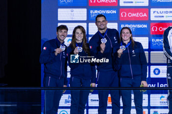 2023-12-10 - Grousset Maxime, Manaudou Florent, Bonnet Charlotte and Gastaldello Beryl of France during the podium ceremony for Mixed 4x50m Medley Relay at the LEN Short Course European Championships 2023 on December 10, 2023 in Otopeni, Romania - SWIMMING - LEN SHORT COURSE EUROPEAN CHAMPIONSHIPS 2023 - DAY 6 - SWIMMING - SWIMMING