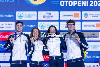 10/12/2023 - Mora Lorenzo, Martinenghi Nicolo, di Pietro Silvia and Nocentini Jasmine of Italy during the podium ceremony for Mixed 4x50m Medley Relay at the LEN Short Course European Championships 2023 on December 10, 2023 in Otopeni, Romania - SWIMMING - LEN SHORT COURSE EUROPEAN CHAMPIONSHIPS 2023 - DAY 6 - NUOTO - NUOTO