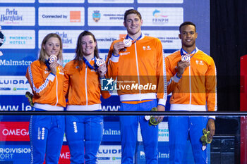 10/12/2023 - Toussaint Kira, Corbeau Caspar, Giele Tessa and Simons Knezo of the Netherlands during the podium ceremony for Mixed 4x50m Medley Relay at the LEN Short Course European Championships 2023 on December 10, 2023 in Otopeni, Romania - SWIMMING - LEN SHORT COURSE EUROPEAN CHAMPIONSHIPS 2023 - DAY 6 - NUOTO - NUOTO