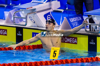 2023-12-10 - Mora Lorenzo of Italy celebrating the win during Men’s 200m Backstroke at the LEN Short Course European Championships 2023 on December 10, 2023 in Otopeni, Romania - SWIMMING - LEN SHORT COURSE EUROPEAN CHAMPIONSHIPS 2023 - DAY 6 - SWIMMING - SWIMMING
