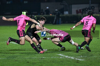 2023-12-16 - Tackle of Ignacio Rex, outside centre of Benetton Rugby, during the EPCR CHALLENGE CUP match between Benetton Rugby and USAP Perpignan on 16 December 2023 at Stadio Monigo in Treviso, Italy - BENETTON RUGBY VS USAP - CHALLENGE CUP - RUGBY