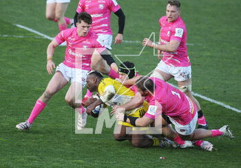 2023-04-03 - Levani Botia of Stade Rochelais is tackled during the Heineken Champions Cup, Round of 16, Rugby union match between Stade Rochelais (La Rochelle) and Gloucester Rugby on April 1, 2023 at Marcel Deflandre stadium in La Rochelle, France - RUGBY - CHAMPIONS CUP - LA ROCHELLE V GLOUCESTER - CHAMPIONS CUP - RUGBY