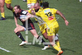 2023-04-09 - Max Malins of Saracens and Jonathan Danty, Reda Wardi of Stade Rochelais during the Heineken Champions Cup, Quarter Finals, rugby union match between Stade Rochelais (La Rochelle) and Saracens on April 9, 2023 at Marcel Deflandre stadium in La Rochelle, France - RUGBY - CHAMPIONS CUP - LA ROCHELLE V SARACENS - CHAMPIONS CUP - RUGBY