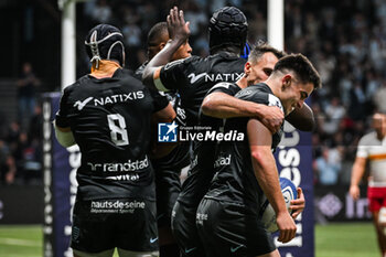 2023-12-10 - Nolann LE GARREC of Racing 92 celebrate his try with teammates during the Investec Champions Cup, Pool 2 rugby union match between Racing 92 and Harlequins on December 10, 2023 at Paris La Defense Arena in Nanterre, France - RUGBY - CHAMPIONS CUP - RACING 92 V HARLEQUINS - CHAMPIONS CUP - RUGBY