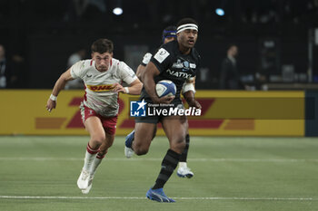2023-12-10 - Vinaya Habosi of Racing 92, left Nick David of Harlequins during the EPCR Champions Cup, Pool 2 rugby union match between Racing 92 and Harlequins on December 10, 2023 at Paris La Défense Arena in Nanterre near Paris, France - RUGBY - CHAMPIONS CUP - RACING 92 V HARLEQUINS - CHAMPIONS CUP - RUGBY