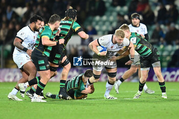 2023-12-15 - Northampton Saints back row Sam Graham (8) tackles Toulon RC lock David Ribbans (5) during the Champions Cup, rugby union match between Northampton Saints and RC Toulon on 15 December 2023 at Franklins Gardens in Northampton, England - RUGBY - CHAMPIONS CUP - NORTHAMPTON V TOULON - CHAMPIONS CUP - RUGBY