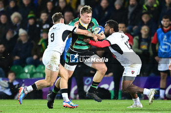 2023-12-15 - Northampton Saints centre Tommy Freeman (13) tackled by Toulon RC scrum half Ben White (9) and Toulon RC centre Seteriki Tuicuvu (13) during the Champions Cup, rugby union match between Northampton Saints and RC Toulon on 15 December 2023 at Franklins Gardens in Northampton, England - RUGBY - CHAMPIONS CUP - NORTHAMPTON V TOULON - CHAMPIONS CUP - RUGBY