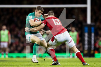 04/02/2023 - Garry Ringrose of Ireland is tackled by George North of Wales during the Six Nations 2023, rugby union match between Wales and Ireland on February 4, 2023 at Millenium Stadium in Cardiff, Wales - RUGBY - SIX NATIONS 2023 - WALES V IRELAND - 6 NAZIONI - RUGBY