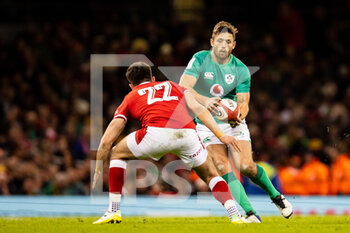 04/02/2023 - Ross Byrne of Ireland under pressure from Owen Williams of Wales during the Six Nations 2023, rugby union match between Wales and Ireland on February 4, 2023 at Millenium Stadium in Cardiff, Wales - RUGBY - SIX NATIONS 2023 - WALES V IRELAND - 6 NAZIONI - RUGBY