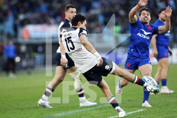 2023-02-05 - Ange Capuozzo of Italy kicks the ball during the 2023 Six Nations, rugby union match between Italy and France on February 5, 2023 at Stadio Olimpico in Rome, Italy - RUGBY - 6 NATIONS 2023 - ITALY V FRANCE - SIX NATIONS - RUGBY