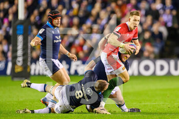 11/02/2023 - Liam Williams of Wales is tackled by Zander Fagerson and Matt Fagerson of Scotland during the Six Nations 2023, rugby union match between Scotland and Wales on February 11, 2023 at BT Murrayfield Stadium in Edinburgh, Scotland - RUGBY - SIX NATIONS 2023 - SCOTLAND V WALES - 6 NAZIONI - RUGBY