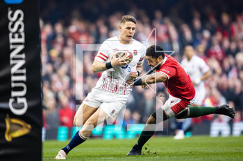 25/02/2023 - Freddie Steward of England under pressure from Taulupe Faletau of Wales during the Six Nations 2023 rugby union match between Wales and England on 25 February 2023 at Principality Stadium in Cardiff, Wales - RUGBY - SIX NATIONS 2023 - WALES V ENGLAND - 6 NAZIONI - RUGBY