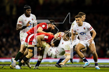 25/02/2023 - Alex Dombrandt of England is tackled by Mason Grady of Wales during the Six Nations 2023 rugby union match between Wales and England on 25 February 2023 at Principality Stadium in Cardiff, Wales - RUGBY - SIX NATIONS 2023 - WALES V ENGLAND - 6 NAZIONI - RUGBY