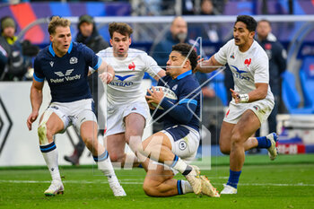 26/02/2023 - Sione Tuipulotu of Scotland and Damian Penaud, Yoram Moefana of France during the Six Nations 2023 rugby union match between France and Scotland on 26 February 2023 at Stade de France in Saint-Denis near Paris, France - RUGBY - SIX NATIONS 2023 - FRANCE V SCOTLAND - 6 NAZIONI - RUGBY