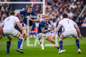 26/02/2023 - Stuart Hogg of Scotland runs at Paul Willemse and Charles Ollivon of France during the Six Nations 2023 rugby union match between France and Scotland on 26 February 2023 at Stade de France in Saint-Denis near Paris, France - RUGBY - SIX NATIONS 2023 - FRANCE V SCOTLAND - 6 NAZIONI - RUGBY