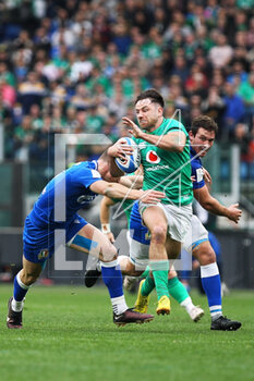 25/02/2023 - Hugo Keenan of Ireland in action during the Six Nations 2023 rugby union match between Italy and Ireland on February 25, 2023 at Stadio Olimpico in Rome, Italy - RUGBY - SIX NATIONS 2023 - ITALY V IRELAND - 6 NAZIONI - RUGBY