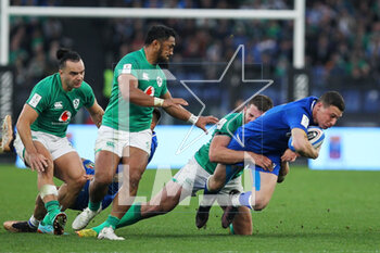 25/02/2023 - James Lowe (L), Bundee Aki (2L), Stuart McCloskey (2R) of Ireland, and Paolo Garbisi (R) of Italy during the Six Nations 2023 rugby union match between Italy and Ireland on February 25, 2023 at Stadio Olimpico in Rome, Italy - RUGBY - SIX NATIONS 2023 - ITALY V IRELAND - 6 NAZIONI - RUGBY