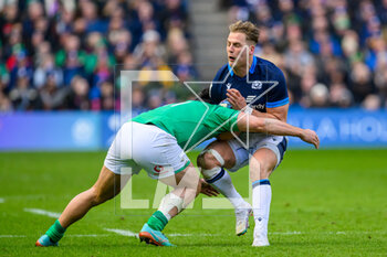 12/03/2023 - Duhan van der Merwe of Scotland is tackled by James Lowe of Ireland during the Six Nations 2023 rugby union match between Scotland and Ireland on 12 March 2023 at BT Murrayfield in Edinburgh, Scotland - RUGBY - SIX NATIONS 2023 - SCOTLAND V IRELAND - 6 NAZIONI - RUGBY