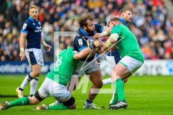 12/03/2023 - Pierre Schoeman of Scotland is tackled by Peter O'Mahony and Tadhg Furlong of Ireland during the Six Nations 2023 rugby union match between Scotland and Ireland on 12 March 2023 at BT Murrayfield in Edinburgh, Scotland - RUGBY - SIX NATIONS 2023 - SCOTLAND V IRELAND - 6 NAZIONI - RUGBY