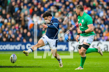 12/03/2023 - Sione Tuipulotu of Scotland kicks clear during the Six Nations 2023 rugby union match between Scotland and Ireland on 12 March 2023 at BT Murrayfield in Edinburgh, Scotland - RUGBY - SIX NATIONS 2023 - SCOTLAND V IRELAND - 6 NAZIONI - RUGBY