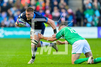 12/03/2023 - Matt Fagerson of Scotland tries to break through the tackle of Johnny Sexton of Ireland during the Six Nations 2023 rugby union match between Scotland and Ireland on 12 March 2023 at BT Murrayfield in Edinburgh, Scotland - RUGBY - SIX NATIONS 2023 - SCOTLAND V IRELAND - 6 NAZIONI - RUGBY