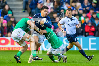 12/03/2023 - Sione Tuipulotu of Scotland is tackled by Josh Van der Flier of Ireland during the Six Nations 2023 rugby union match between Scotland and Ireland on 12 March 2023 at BT Murrayfield in Edinburgh, Scotland - RUGBY - SIX NATIONS 2023 - SCOTLAND V IRELAND - 6 NAZIONI - RUGBY