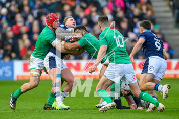 12/03/2023 - Stuart Hogg of Scotland is tackled by Josh Van der Flier and Bundee Aki of Ireland during the Six Nations 2023 rugby union match between Scotland and Ireland on 12 March 2023 at BT Murrayfield in Edinburgh, Scotland - RUGBY - SIX NATIONS 2023 - SCOTLAND V IRELAND - 6 NAZIONI - RUGBY