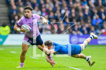 2023-03-18 - Sione Tuipulotu of Scotland is tackled by Alessandro Fusco of Italy during the Six Nations 2023 rugby union match between Scotland and Italy on 18 March 2023 at the BT Murrayfield Stadium in Edinburgh, Scotland - RUGBY - SIX NATIONS 2023 - SCOTLAND V ITALY - SIX NATIONS - RUGBY