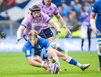 2023-03-18 - Lorenzo Cannone of Italy retrieves the ball ahead of Jonny Gray of Scotland during the Six Nations 2023 rugby union match between Scotland and Italy on 18 March 2023 at the BT Murrayfield Stadium in Edinburgh, Scotland - RUGBY - SIX NATIONS 2023 - SCOTLAND V ITALY - SIX NATIONS - RUGBY