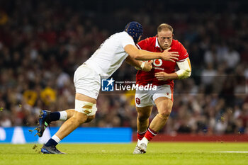 2023-08-05 - Corey Domachowski of Wales under pressure from George Martin of England during the Summer Nations Series 2023, rugby union match between Wales and England on 5 August 2023 at Millenium Stadium in Cardiff, Wales - RUGBY - SUMMER NATIONS SERIES 2023 - WALES V ENGLAND - TEST MATCH - RUGBY