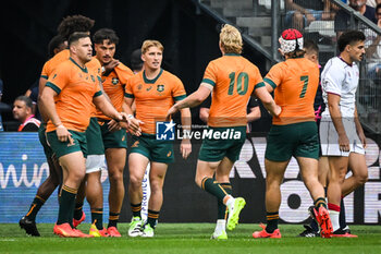 2023-09-09 - Jordan PETAIA of Australia celebrate his try with teammates during the World Cup 2023, Pool C rugby union match between Australia and Georgia on September 9, 2023 at Stade de France in Saint-Denis near Paris, France - RUGBY - WORLD CUP 2023 - AUSTRALIA V GEORGIA - WORLD CUP - RUGBY