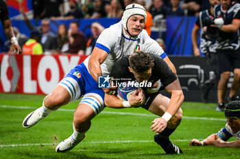 2023-09-29 - Manuel ZULIANI of Italy and Beauden BARRETT of New Zealand during the World Cup 2023, Pool A rugby union match between New Zealand and Italy on September 29, 2023 at Groupama Stadium in Decines-Charpieu near Lyon, France - RUGBY - WORLD CUP 2023 - NEW ZEALAND V ITALY - WORLD CUP - RUGBY