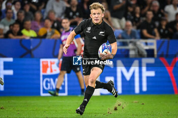2023-09-29 - Damian MCKENZIE of New Zealand during the World Cup 2023, Pool A rugby union match between New Zealand and Italy on September 29, 2023 at Groupama Stadium in Decines-Charpieu near Lyon, France - RUGBY - WORLD CUP 2023 - NEW ZEALAND V ITALY - WORLD CUP - RUGBY