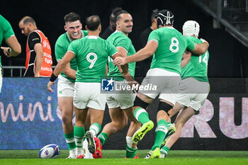 2023-10-07 - James LOWE of Ireland celebrate his try with teammates during the World Cup 2023, Pool B rugby union match between Ireland and Scotland on October 7, 2023 at Stade de France in Saint-Denis near Paris, France - RUGBY - WORLD CUP 2023 - IRELAND V SCOTLAND - WORLD CUP - RUGBY
