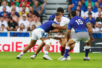 2023-10-07 - Freddie Steward of England is tackles by Tumua Manu, Duncan Paia’Aua of Samoa during the World Cup 2023, Pool D rugby union match between England and Samoa on October 7, 2023 at Pierre Mauroy stadium in Villeneuve-d'Ascq near Lille, France - RUGBY - WORLD CUP 2023 - ENGLAND V SAMOA - WORLD CUP - RUGBY