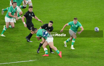 2023-10-14 - Will Jordan of New Zealand, James Lowe and Garry Ringrose of Ireland during the World Cup 2023, Quarter-final rugby union match between Ireland and New Zealand on October 14, 2023 at Stade de France in Saint-Denis near Paris, France - RUGBY - WORLD CUP 2023 - 1/4 - IRELAND V NEW ZEALAND - WORLD CUP - RUGBY