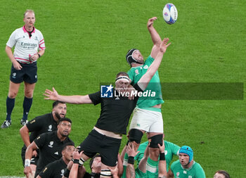 2023-10-14 - Brodie Retallick of New Zealand and Caelan Doris of Ireland during the World Cup 2023, Quarter-final rugby union match between Ireland and New Zealand on October 14, 2023 at Stade de France in Saint-Denis near Paris, France - RUGBY - WORLD CUP 2023 - 1/4 - IRELAND V NEW ZEALAND - WORLD CUP - RUGBY