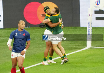 2023-10-15 - Kurt-Lee Arendse of South Africa celebrates his try with Cobus Reinach during the World Cup 2023, Quarter-final rugby union match between France and South Africa on October 15, 2023 at Stade de France in Saint-Denis near Paris, France - RUGBY - WORLD CUP 2023 - 1/4 - FRANCE V SOUTH AFRICA - WORLD CUP - RUGBY