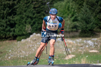 2023-09-16 - Quentin Fillon Maillet during the Biathlon Summer Tour 2023 on September 16, 2023 at Alexis Boeuf stadium in La Féclaz, France - BIATHLON - SUMMER TOUR 2023 - LA FECLAZ - BIATHLON - WINTER SPORTS