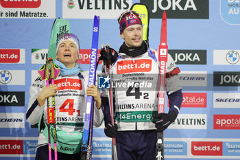 2023-12-28 - Ingrid Landmark Tandrevold and Sturla Holm Laegreid of Norway 2nd place during the 2023 World Team Challenge, Biathlon event on December 28, 2023 at Veltins-Arena in Gelsenkirchen, Germany - BIATHLON - WORLD TEAM CHALLENGE 2023 - BIATHLON - WINTER SPORTS