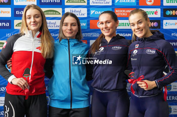 2023-12-03 - Martyna Baran of Poland, Nadezhda Morozova of Kazachstan, Julie Nistad Samsonsen of Norway, Martine Ripsrud of Norway during a ceremony after competing on the Women's B Group 500m during the ISU Speed Skating World Cup Stavanger on December 3, 2023 at Var Energi Arena Sormarka in Stavanger, Norway - SPEED SKATING - WORLD CUP - STAVANGER - ICE SKATING - WINTER SPORTS