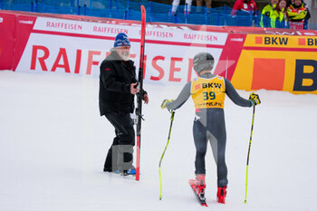 2023-01-13 - 13.01.2023, Wengen, Lauberhorn, FIS Ski World Cup: Lauberorn Super-G,  Matteo Franzoso of Italy received back his ski after a finish line crash - FIS SKI WORLD CUP: LAUBERORN SUPER-G - ALPINE SKIING - WINTER SPORTS