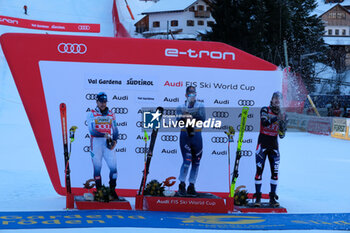 2023-12-16 - (L to R) Podium of Men Downhill race, Second place for Aleksander Aamodt Kilde (NOR), first place for Dominik Paris (ITA) third place for Bryce Bennet (USA) during the Audi FIS Alpine Ski World Cup, Men’s Downhill race on Saslong Slope in Val Gardena on December 16, 2023, Val Gardena, Bozen, Italy. - AUDI FIS SKI WORLD CUP - MEN'S DOWNHILL - ALPINE SKIING - WINTER SPORTS