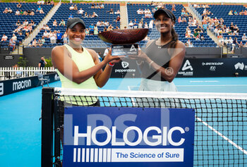 2023-01-07 - Taylor Townsend of the United States & Asia Muhammad of the United States pose with their champions trophy after winning the doubles final of the 2023 Adelaide International 1, WTA 500 tennis tournament on January 7, 2023 in Adelaide, Australia - TENNIS - WTA - 2023 ADELAIDE INTERNATIONAL 1 - INTERNATIONALS - TENNIS